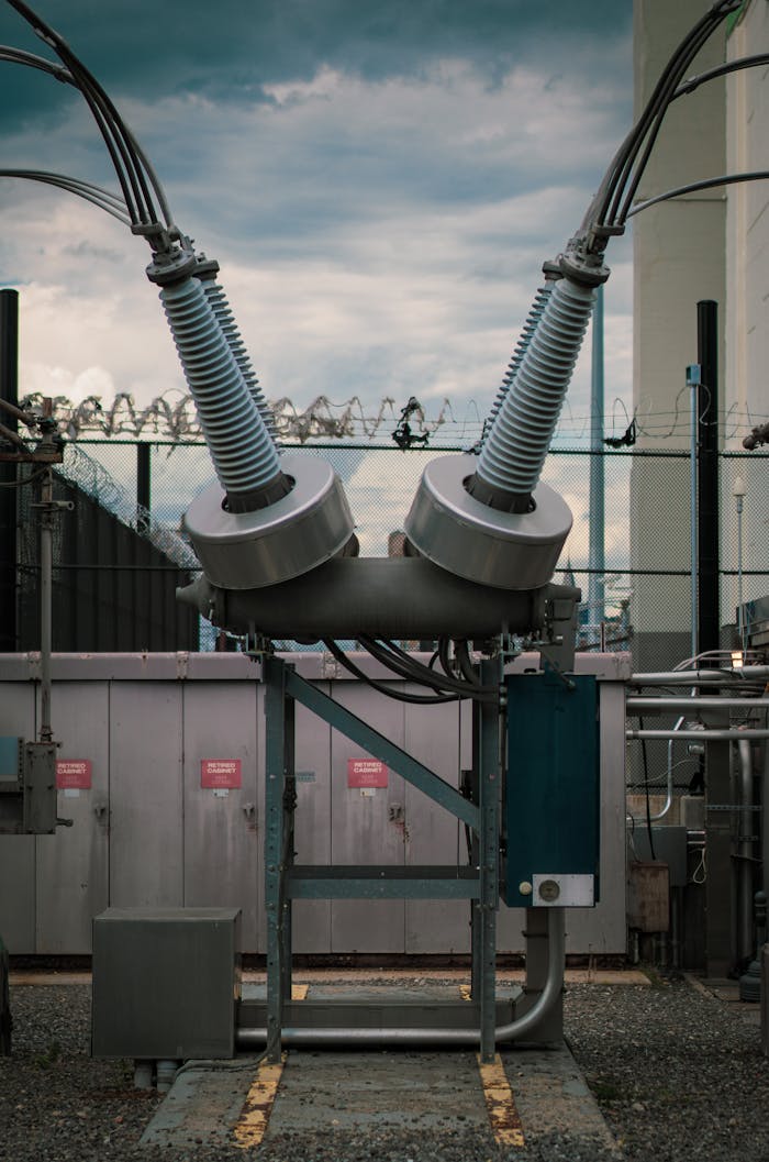 Close-up of a high voltage transformer with barbed wire in New York City.